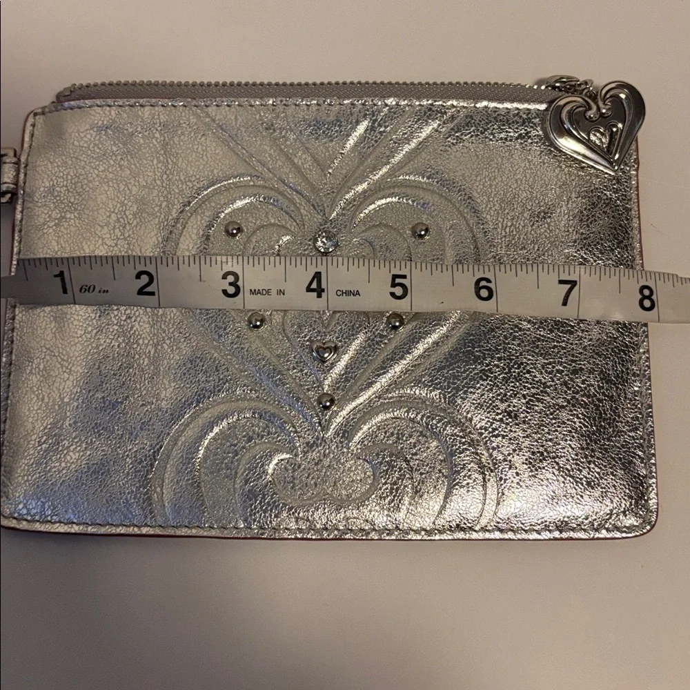 BRIGHTON SILVER METALLIC WRISTLET WITH SOME BLING ON ONE SIDE PLAIN ON THE OTHER